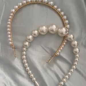 Two pearl headbands. One w/ graduated size pearls the other with smaller pearls